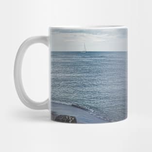 Seascape with a sailboat Mug